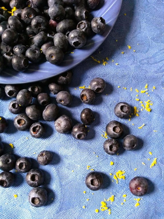 overflowing blueberries sprinkled with lemon zest