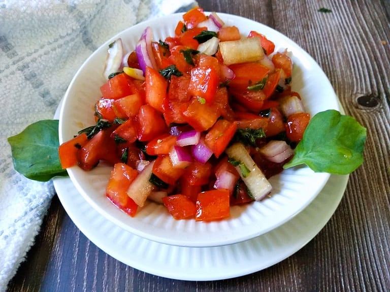 balsamic pico de gallo with tomatoes, red onions, vinegar, honey, and basil